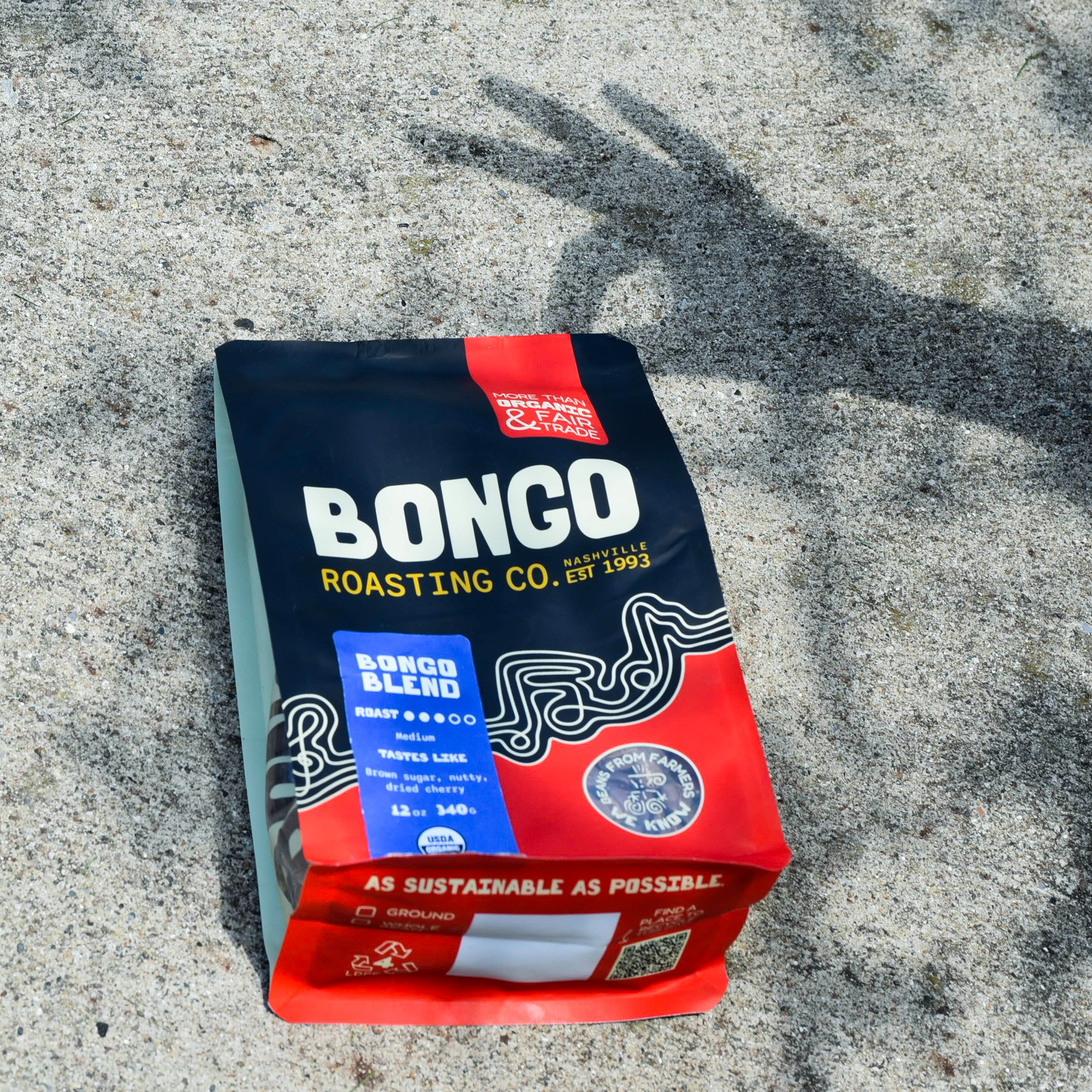 Bongo Roasting Co. coffee package on a concrete surface